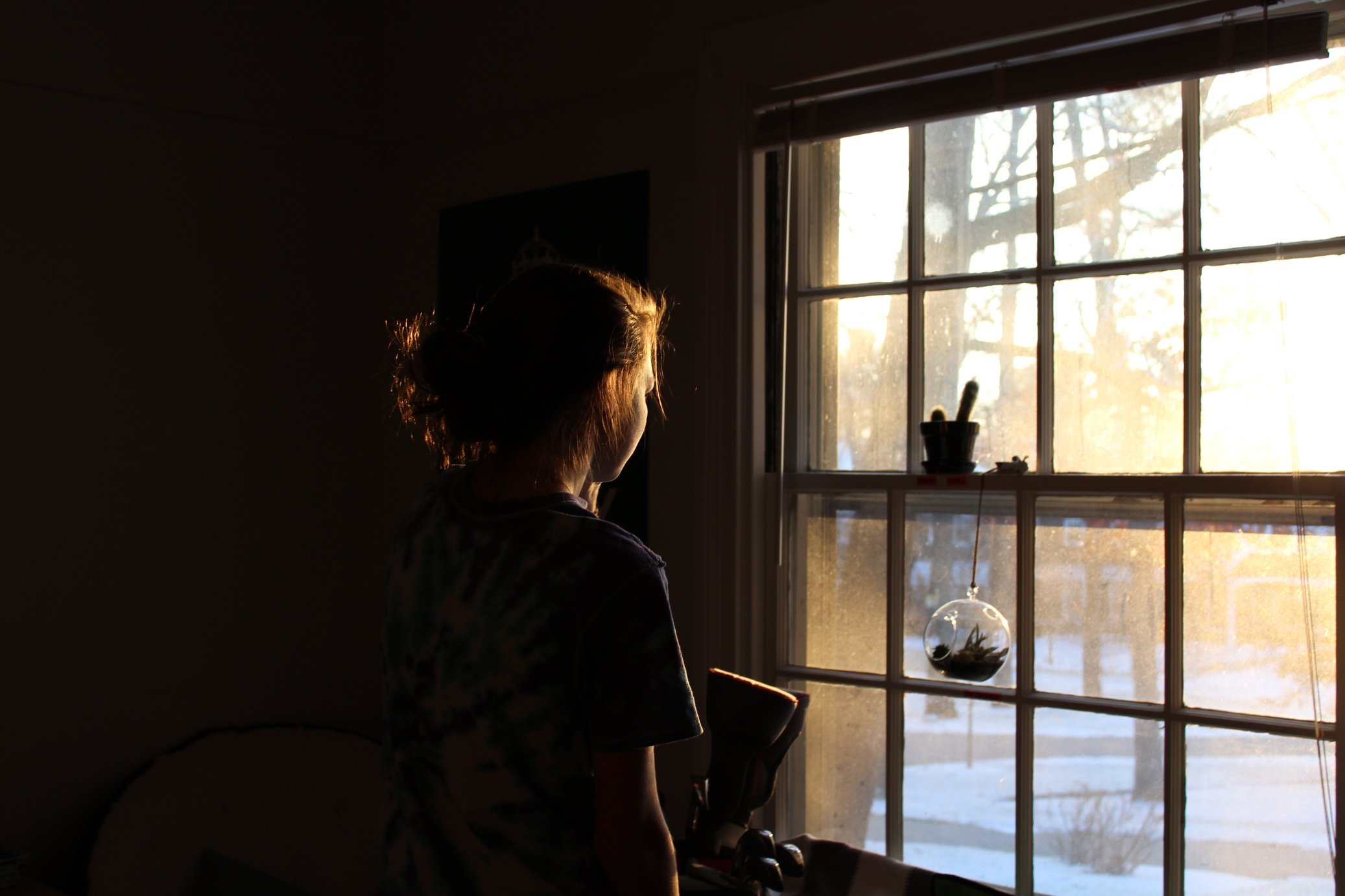 Girl Looking Out the Window